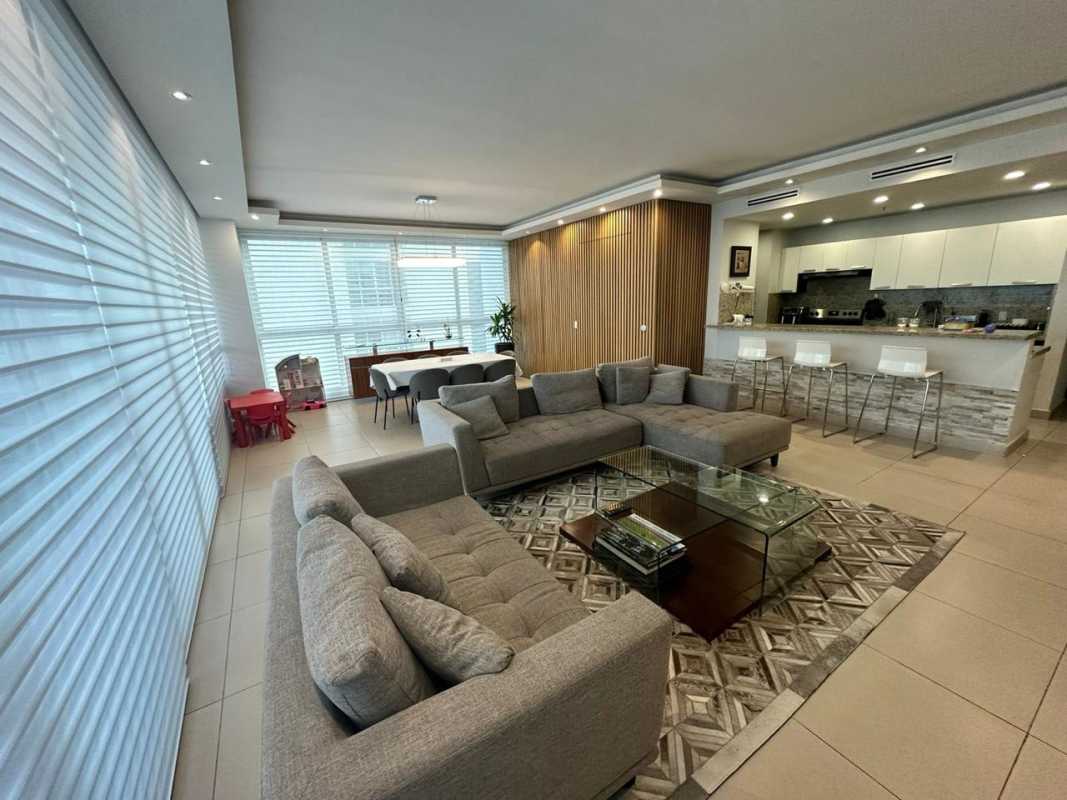 Spacious open-plan living, dining and kitchen with ocean and city views at PH Oceanaire