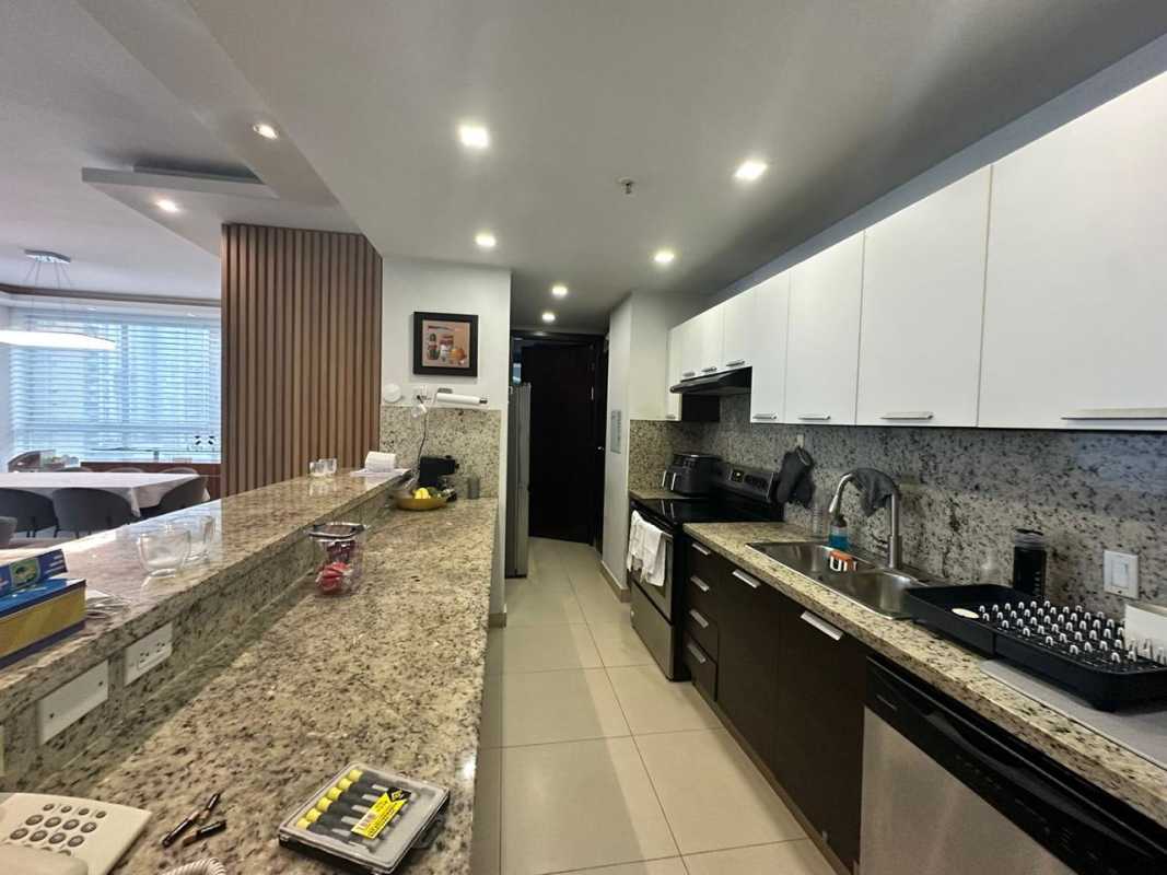 Modern kitchen with granite countertops, dual sink, stainless appliances at PH Oceanaire Panama
