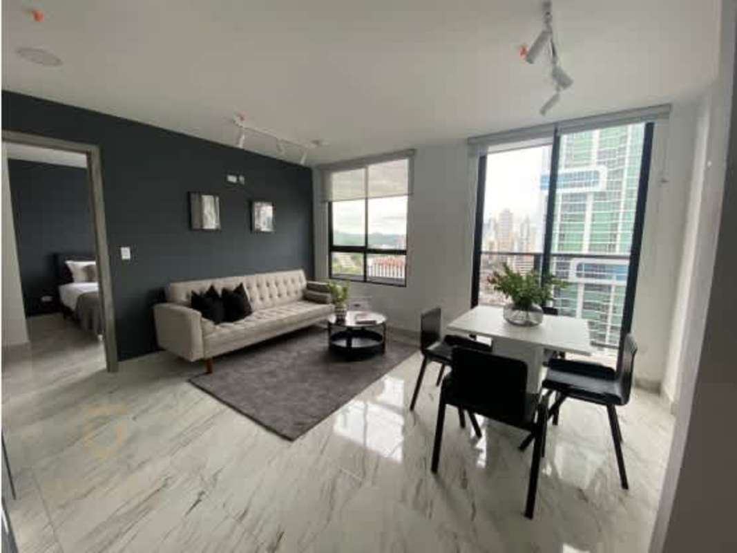 Modern high-rise The Gray Tower with glass facade in Panama City's financial district Calle 50