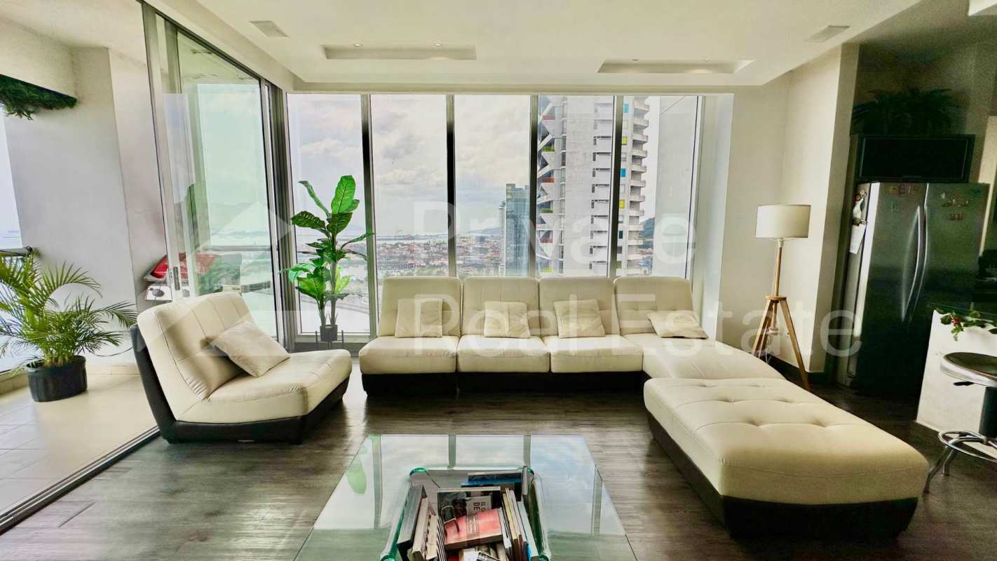 Floor-to-ceiling windows with ocean views in living area PH Rivage Panama