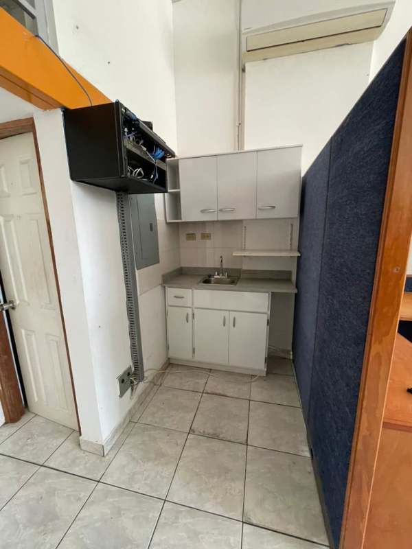 Commercial office area with desks, window, tiled floor PH Plaza Las Arcadas Juan Díaz Panama