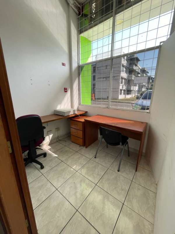 Small kitchenette with sink and network cabinet inside PH Plaza Las Arcadas Panama