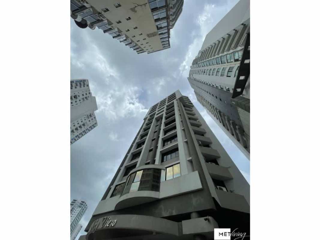 Upward perspective of PH La Loma Residences modern facade balconies panoramic views