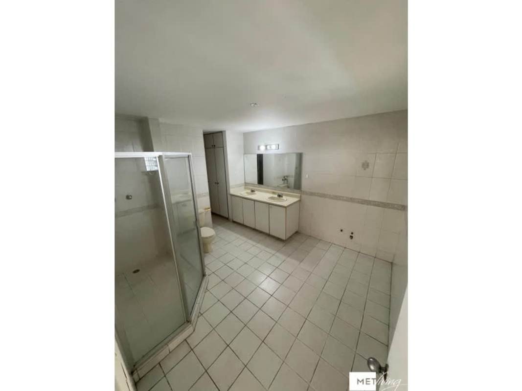 Large bathroom with double sink glass enclosed shower PH La Loma Residences Panama City