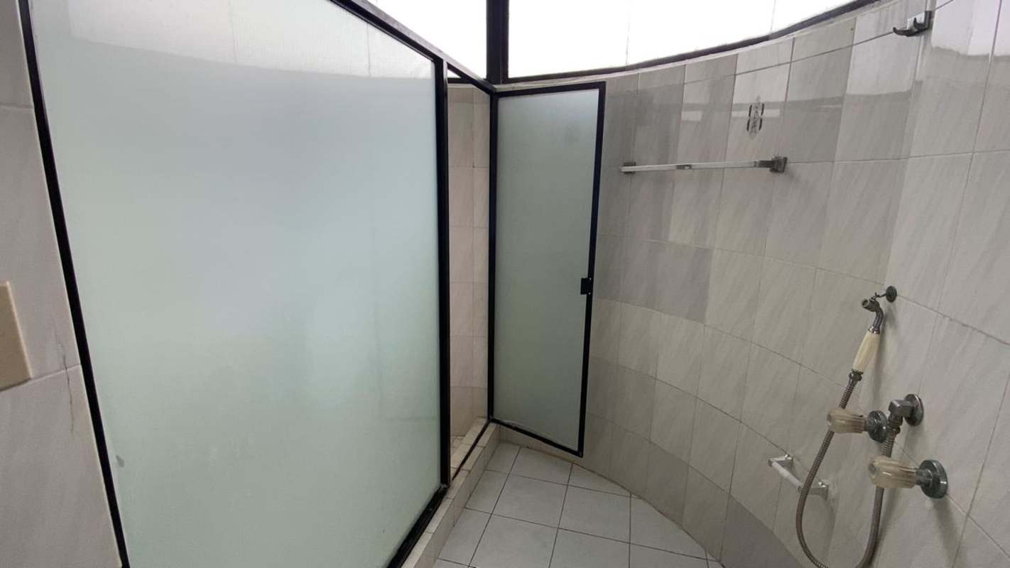 Bedroom with large windows and tiled floor apartment at PH Buganvilla San Francisco Panama City