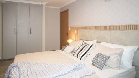 Open living-dining area with terrace access and Pacific Ocean view in The Palms El Palmar