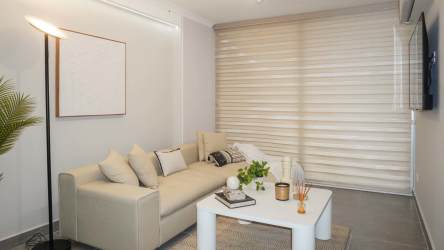 Bright open plan living and dining with ocean view at The Palms El Palmar