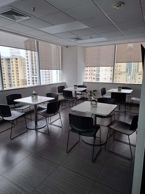 Bright office dining area with city views in Torre de las Américas Panama City