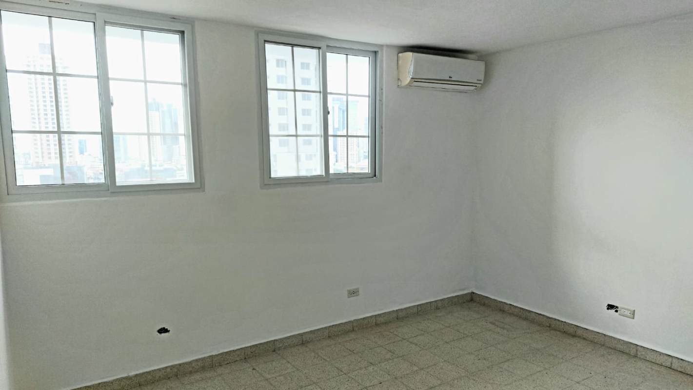 Spacious kitchen with granite countertops tile backsplash and window PH Aileen Panama City