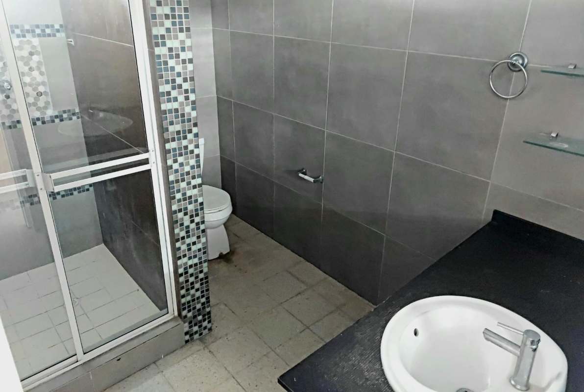 Spacious bright empty room with large windows tiled floors PH Aileen Bella Vista Panama City