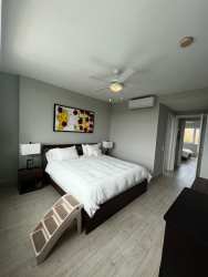 Bathroom with vessel sink, glass shower, ceramic tile in PH Solea Punta Barco Panama