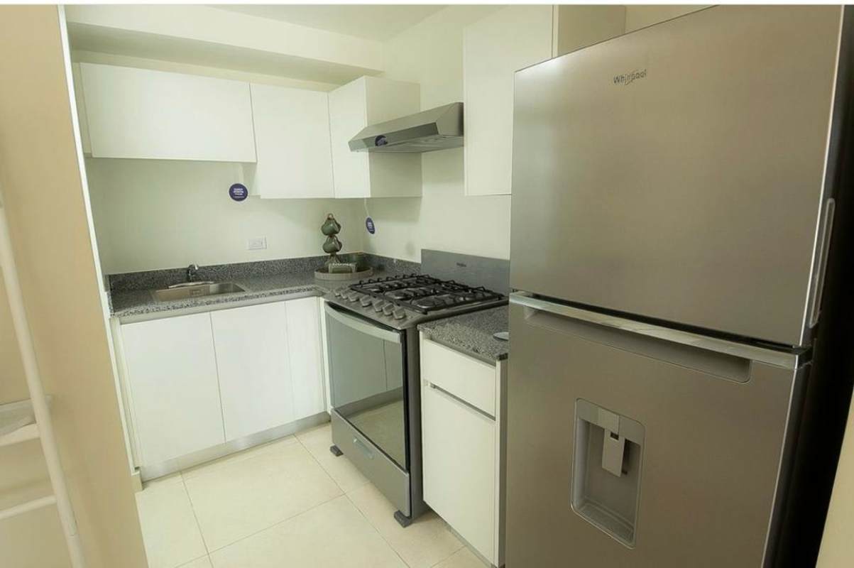 Modern open-plan living dining with large windows and balcony Panama Viejo Panama