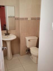 Empty tiled bedroom with ceiling fan in Vista Alegre Panama.