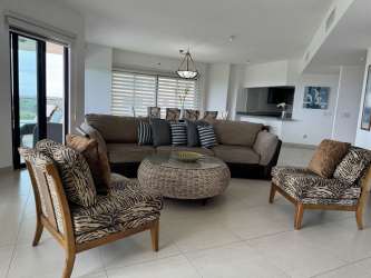 Luxurious master bedroom with balcony access, ocean and golf views at Vista Mar San Carlos Panama