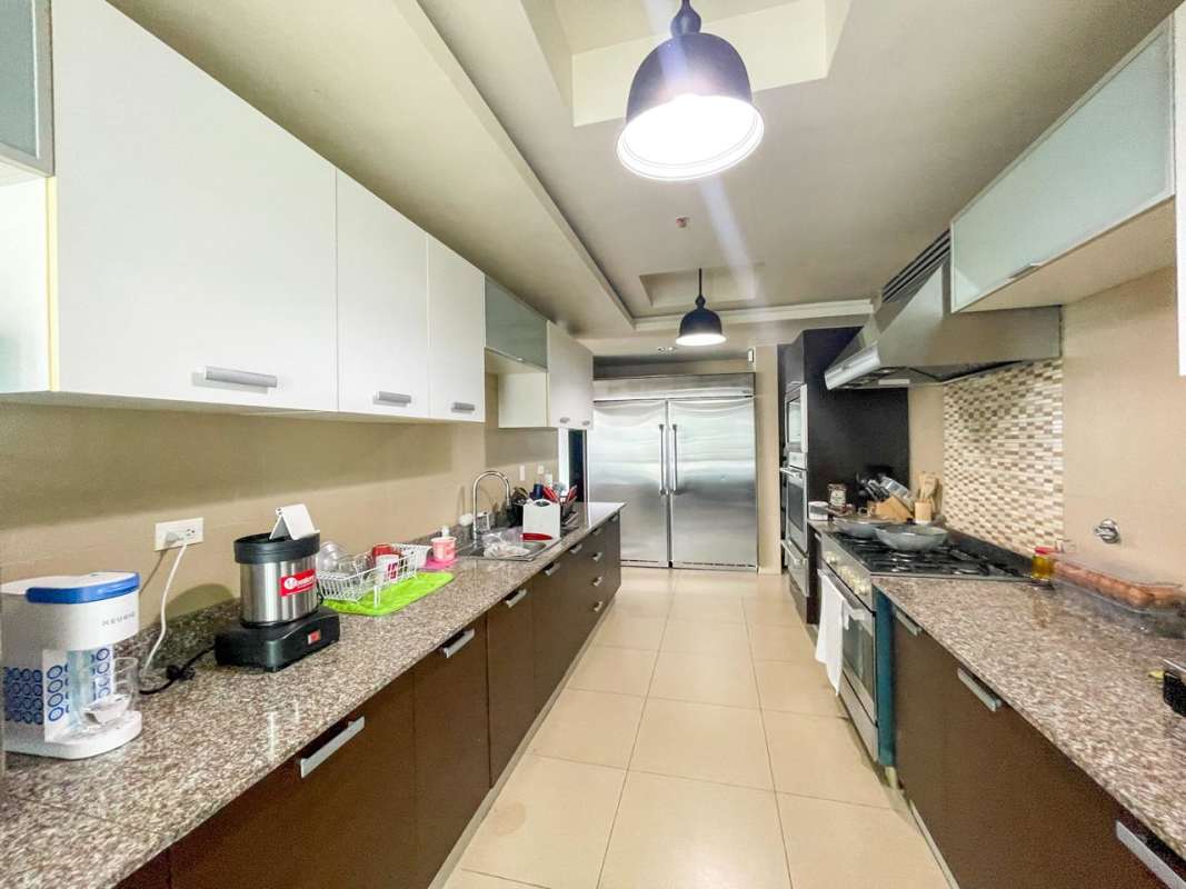 Contemporary kitchen with granite countertops stainless steel appliances PH Q Tower