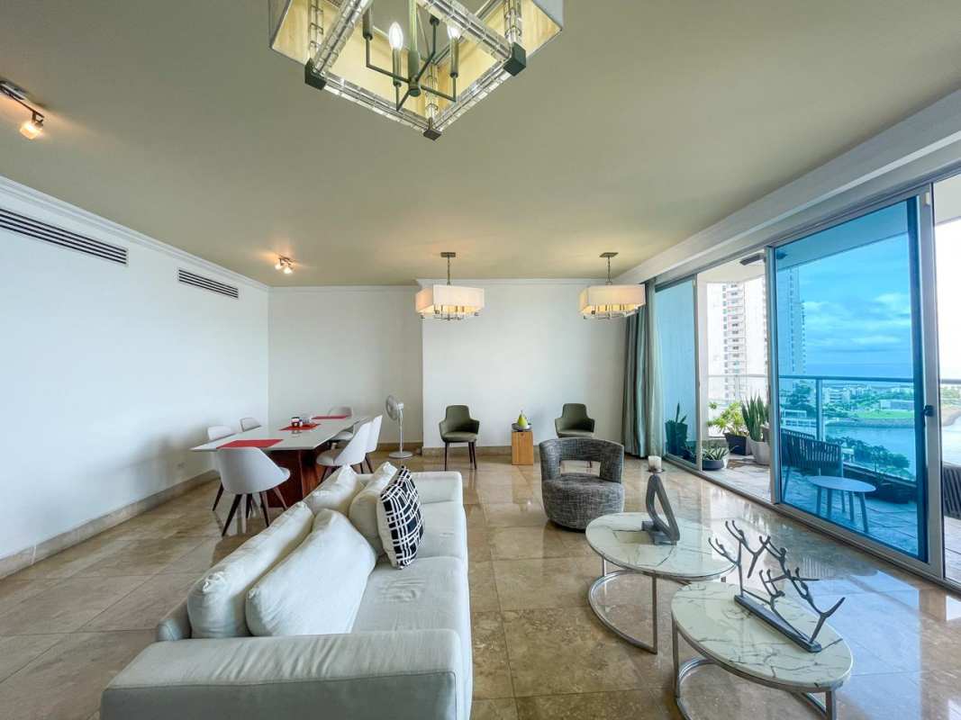 Double height modern lobby with designer decor at PH Q Tower luxury building Punta Pacífica Panama