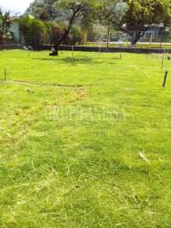 Land in Boquete Highlands fenced boundary lush flat terrain mountain views Panama