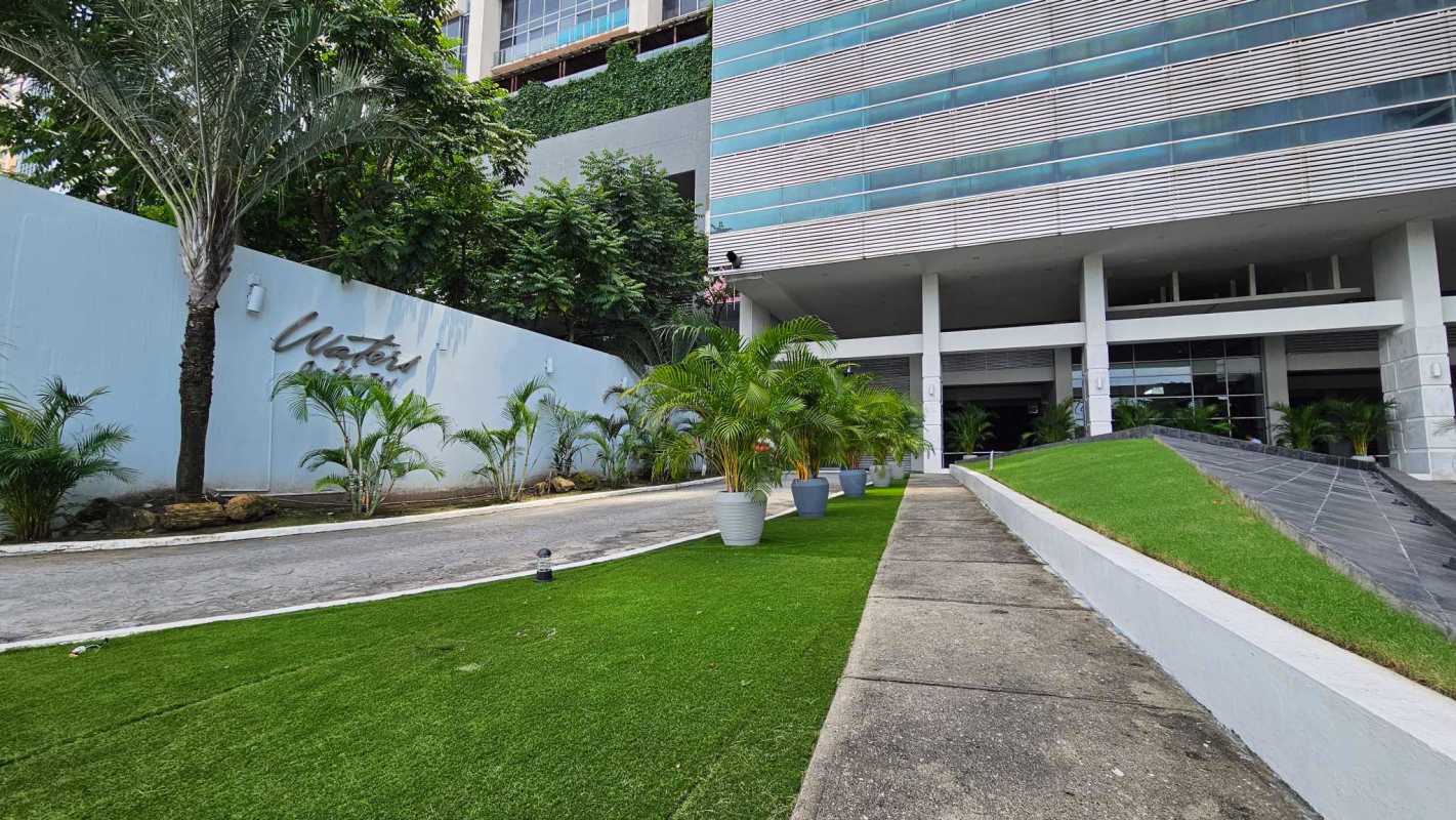 Modern kitchen in PH Waters on the Bay with granite countertops and city views
