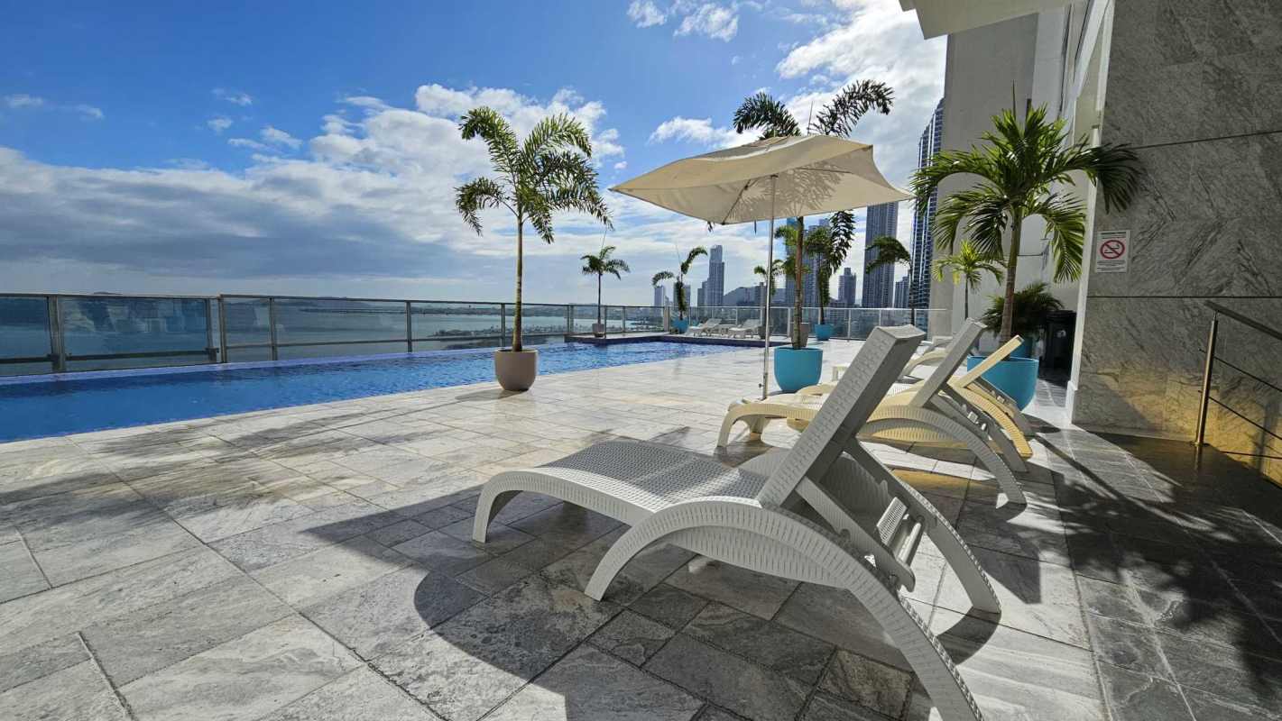 Colorful playroom and rooftop playground at Waters on the Bay Panama with safety fencing