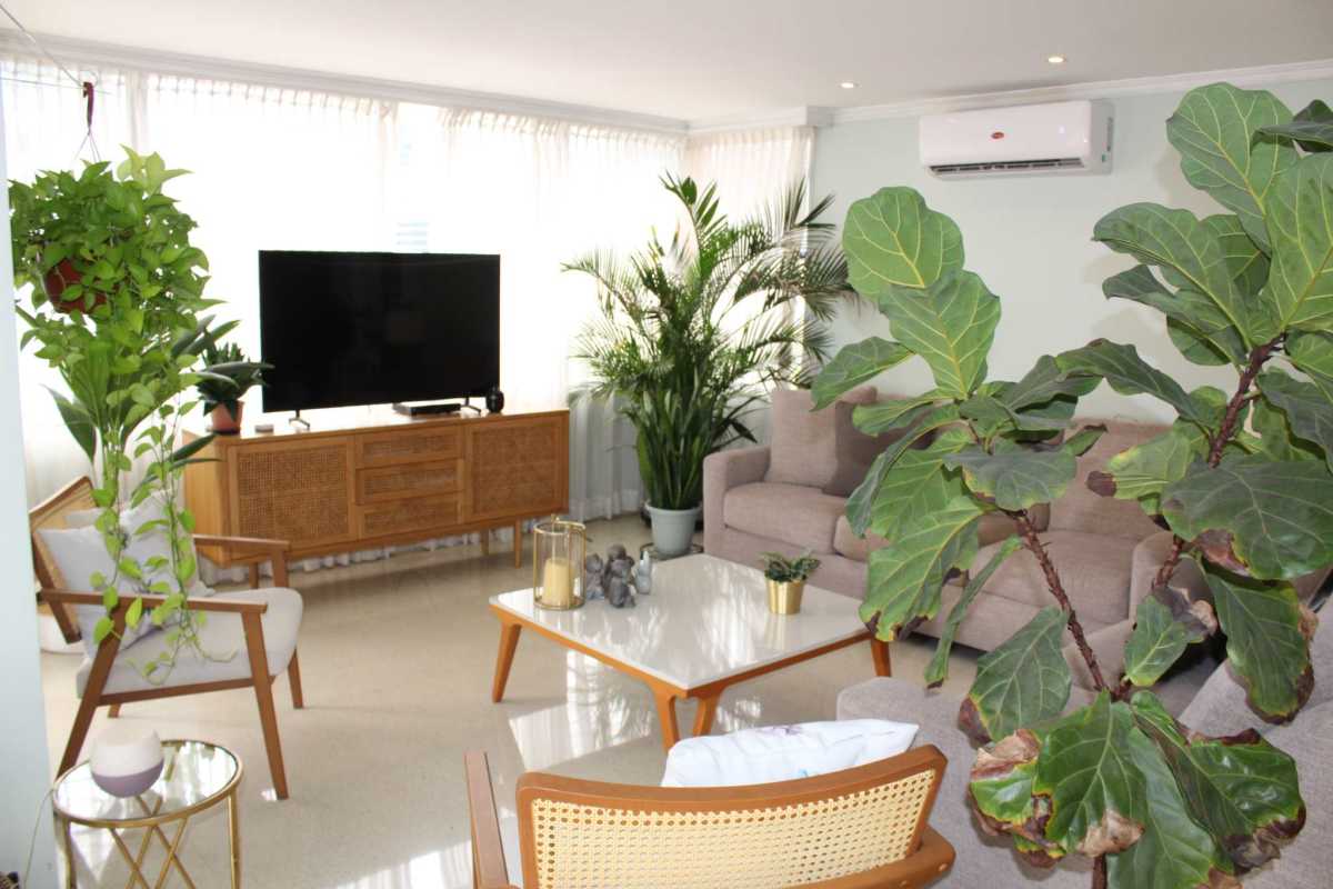 Bedroom with large window and city views in Obarrio apartment Panama City for sale