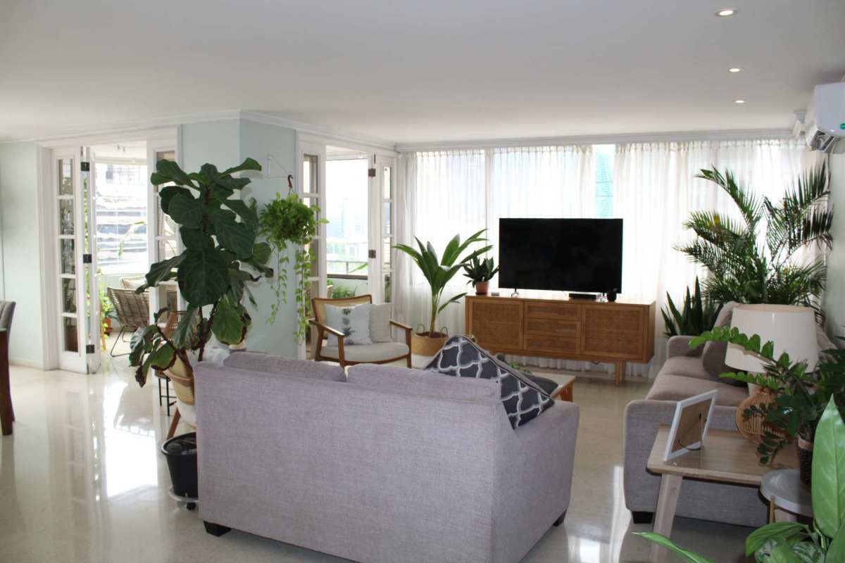 Spacious master bedroom with closet space and large windows in Panama City apartment for sale