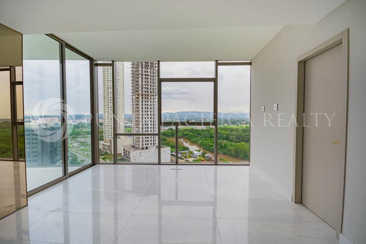 Modern kitchen with marble island, city view windows, luxury finishes at La Maison by Fendi Santa Maria Panama
