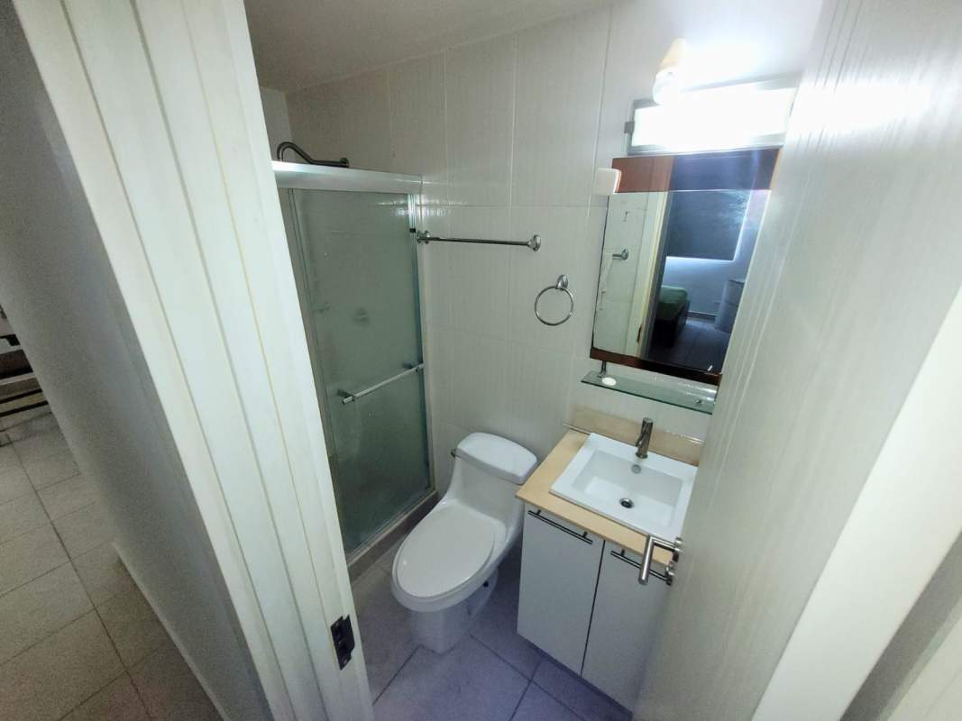 Contemporary bathroom with glass shower, vanity and mirror Condado Country Club Condado del Rey Panama City