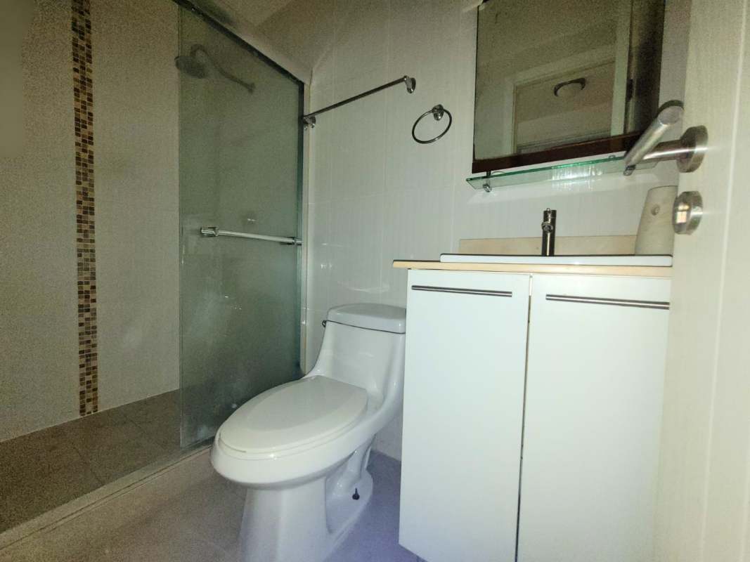 Open concept living and dining area with tile floors in Condado Country Club Condado del Rey Panama City