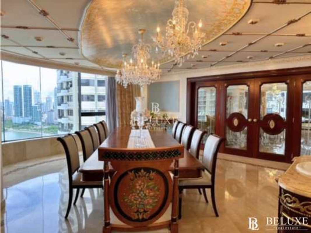 Modern kitchen with island, marble counters, stainless appliances at PH Bayside Panama