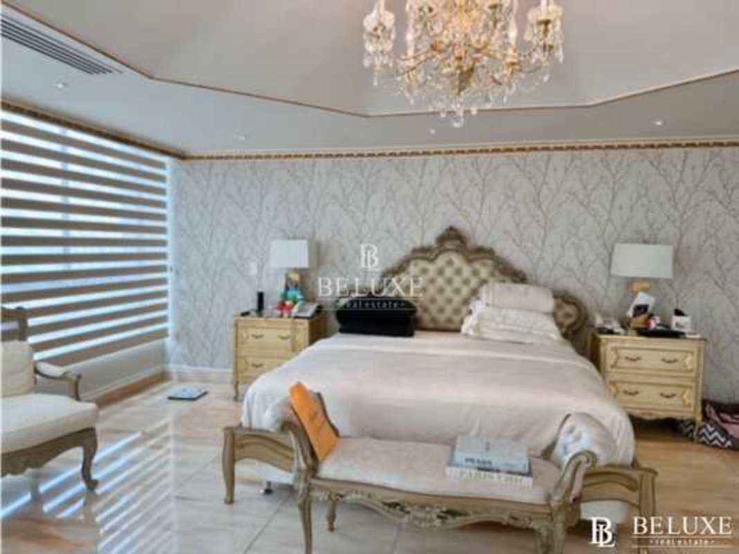 Modern luxury bedroom with large windows in PH Bayside Punta Paitilla Panama City