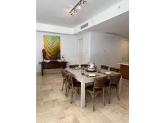 Paved patio and tropical lawn private garden Punta Arena Buenaventura