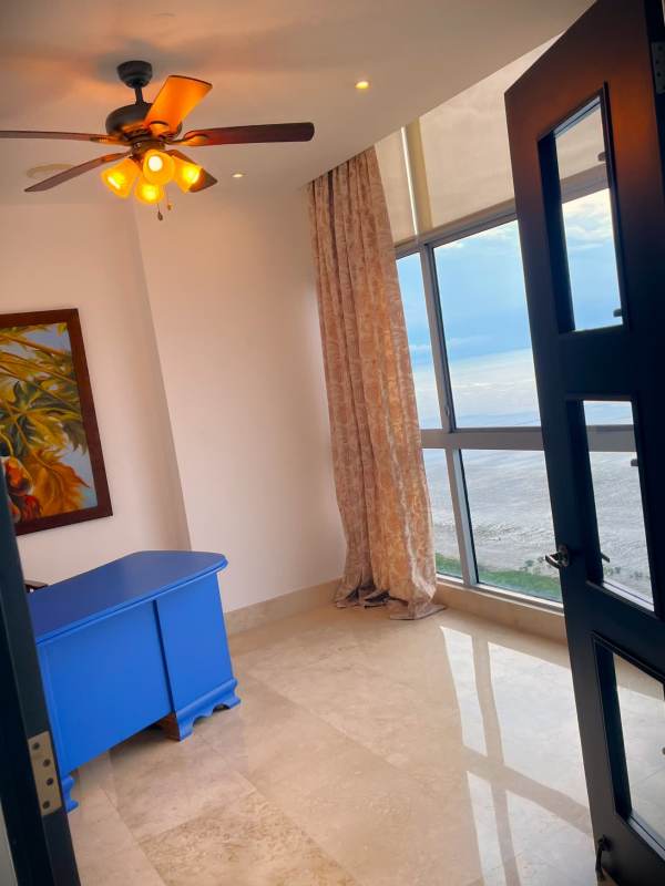 Spacious master bedroom with sea view panoramic windows marble floors PH Ten Tower Costa del Este Panama