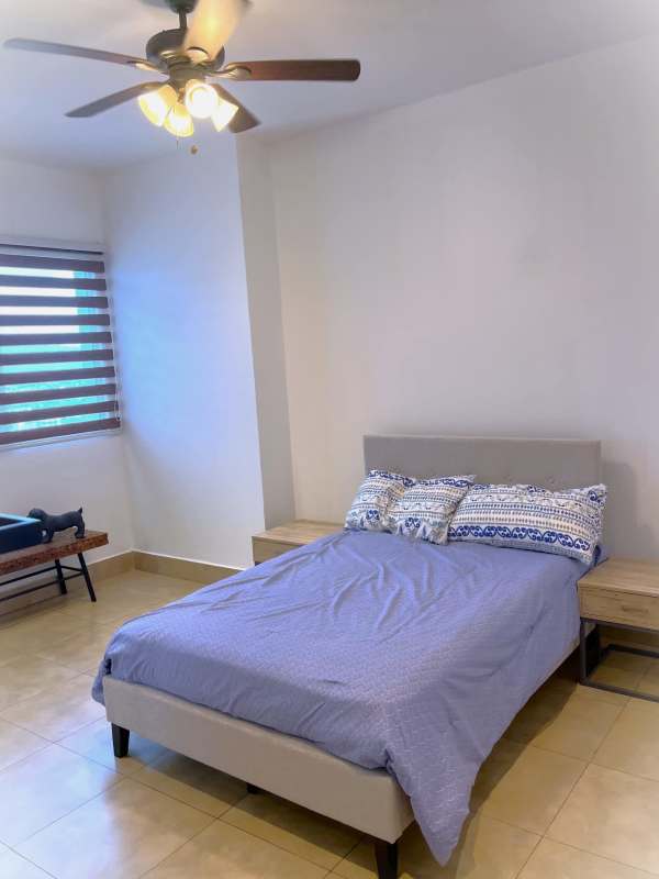 Spacious modern kitchen with granite countertops island and stainless appliances PH Ten Tower Costa del Este