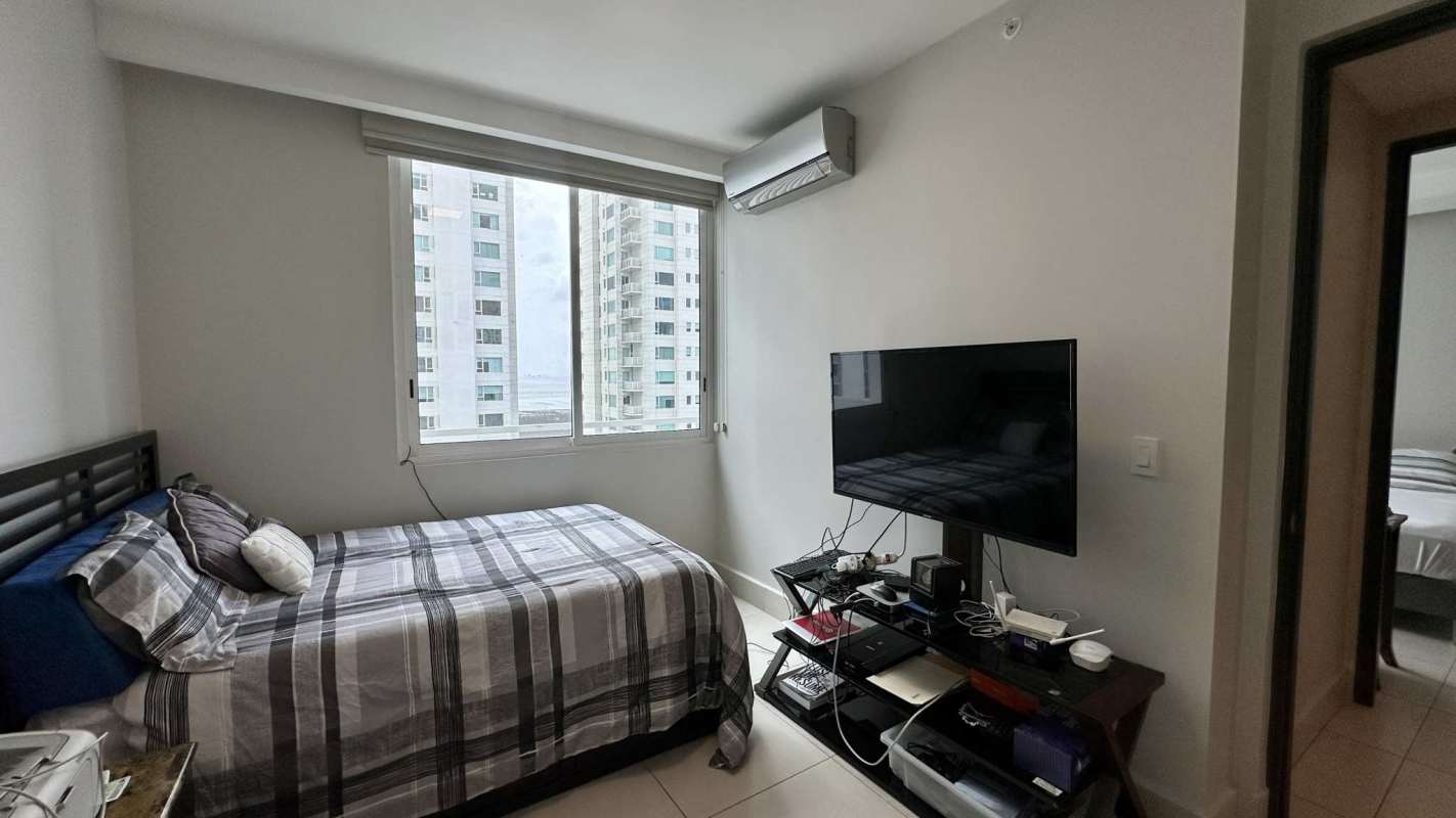 Contemporary kitchen with granite counters, gas stove, stainless appliances in PH Castellammare Costa del Este Panama