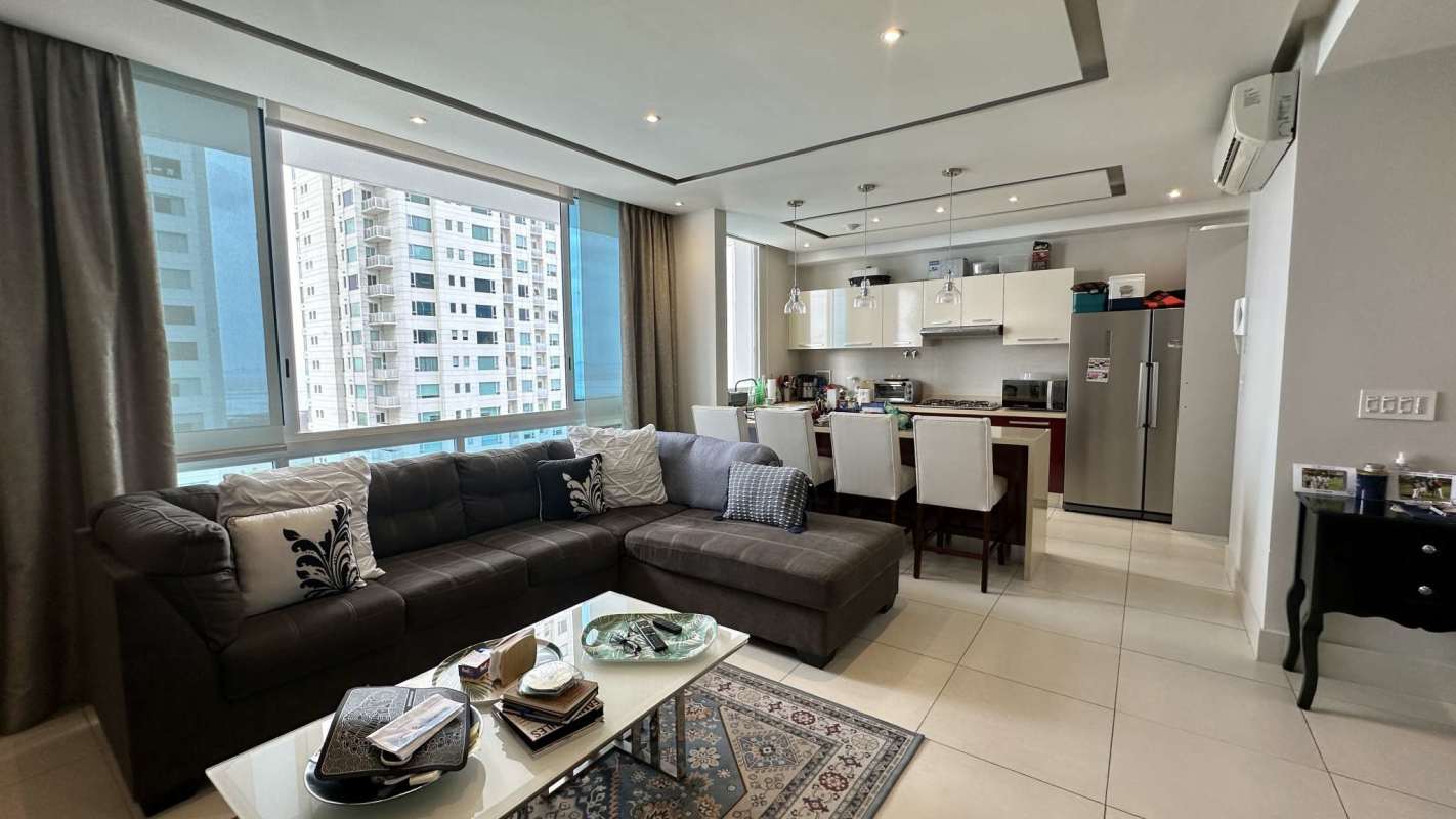 Bright living-dining space with large windows, ocean panorama PH Castellammare Costa del Este Panama
