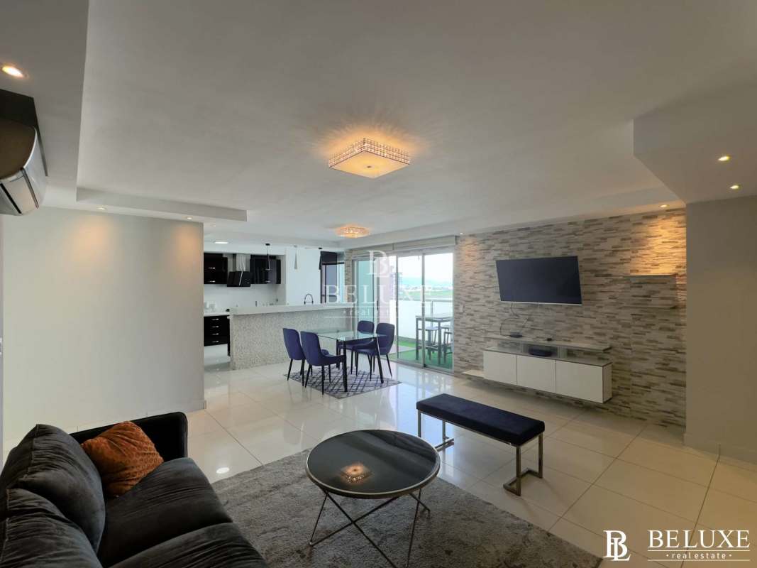 Remodeled open kitchen with breakfast bar island and granite counters PH Moon Tower in San Francisco Panama