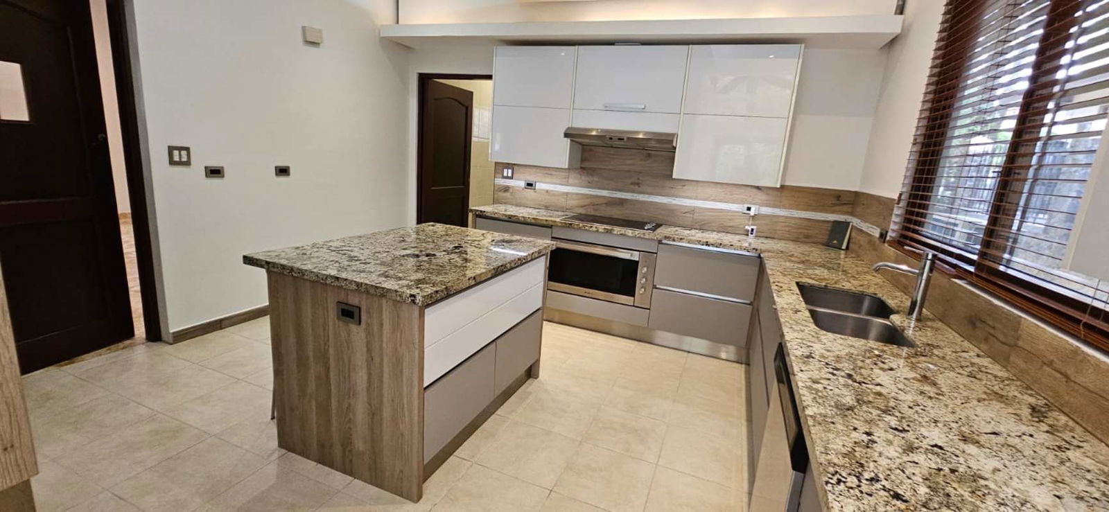 Luxury kitchen with island, granite countertops, modern appliances Camino de Cruces Panama City