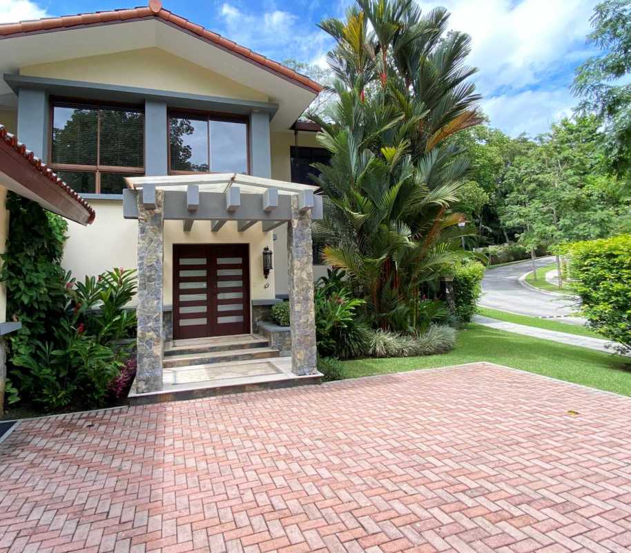 Elegant dining area with large glass doors to tropical garden in Camino de Cruces Clayton