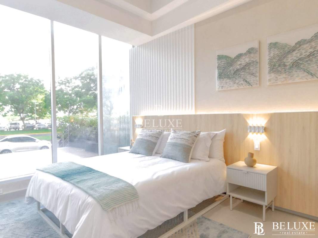 Modern compact white kitchen with stainless appliances PH Seaside House Panama