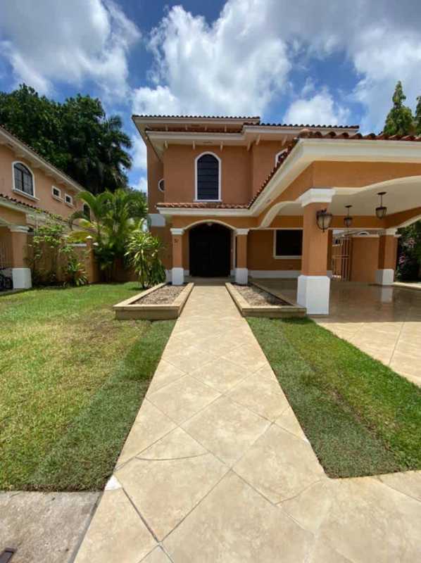 Covered terrace with fan, tile floor and private garden in luxury villa Clayton Panama