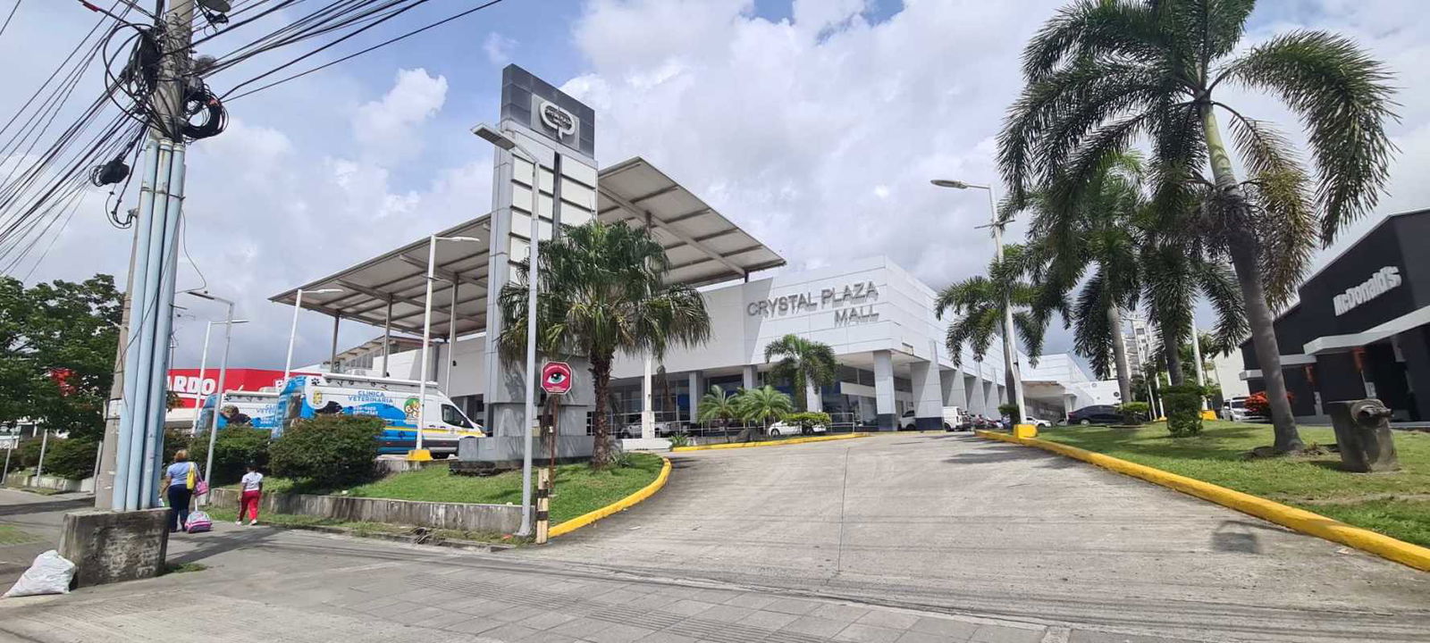 Exterior view of corner glass storefront commercial unit Crystal Plaza Los Pueblos Panama