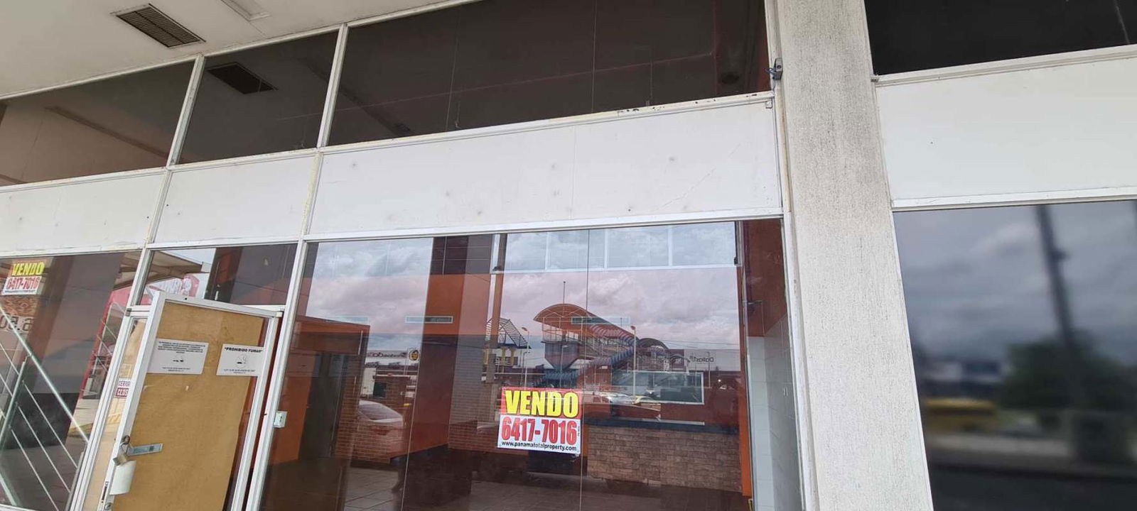 Glass retail storefront with signage space Crystal Plaza Panama City