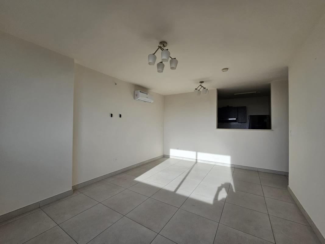Open living room with natural light and city neighborhood views PH Vista Horizonte Vista Hermosa Panama