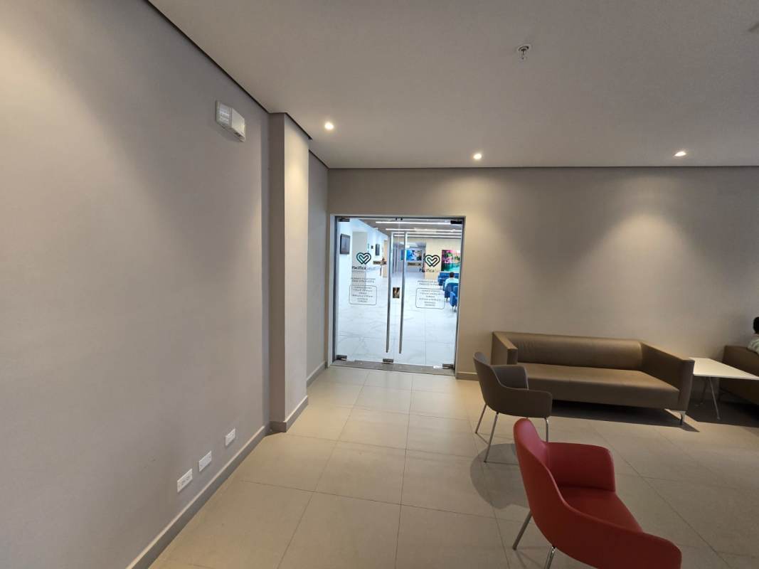 Modern multi-story commercial building exterior with retail plaza Town Center Costa del Este Panama