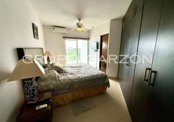 Modern kitchen with granite counters large window ocean views PH Patricia Italia Panama