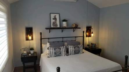Cozy guest bedroom with lake views, en-suite bath inside beach villa Buenaventura Panama