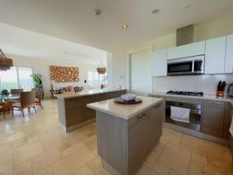 Open concept kitchen dining area modern design at Puntarena Buenaventura Panama