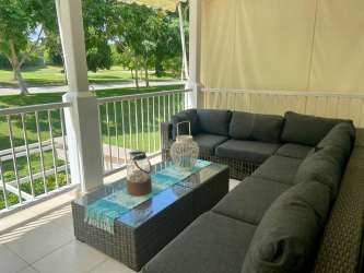 Panoramic golf course view from apartment terrace in PH Rodman Bijao Beach Panama