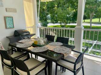 Comfortable master bedroom with a view of golf course and air conditioning at PH Rodman Bijao Panama