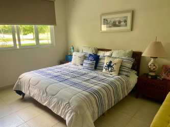 Wide terrace overlooking golf course with BBQ setup at PH Rodman Bijao Beach Panama